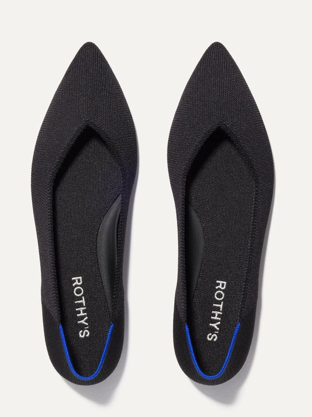 Rothy's Black Pointed Knit Flats with Blue Heel Trim